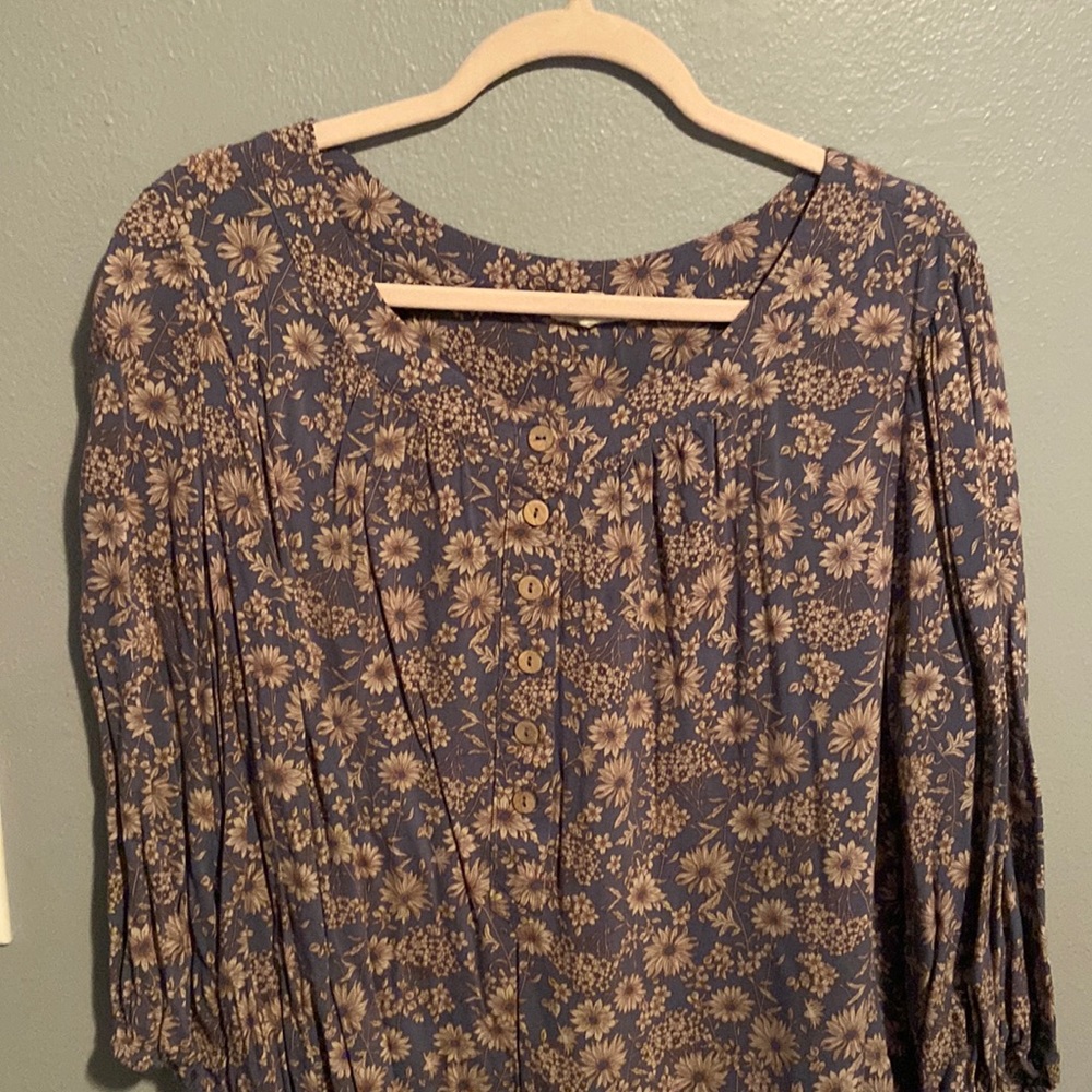 Light blue top with tan flowers and buttons